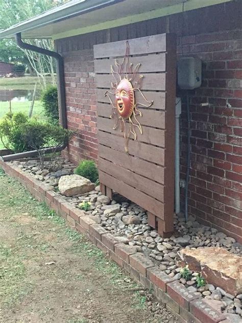 how to cover up electrical box in yard|how to hide utility boxes.